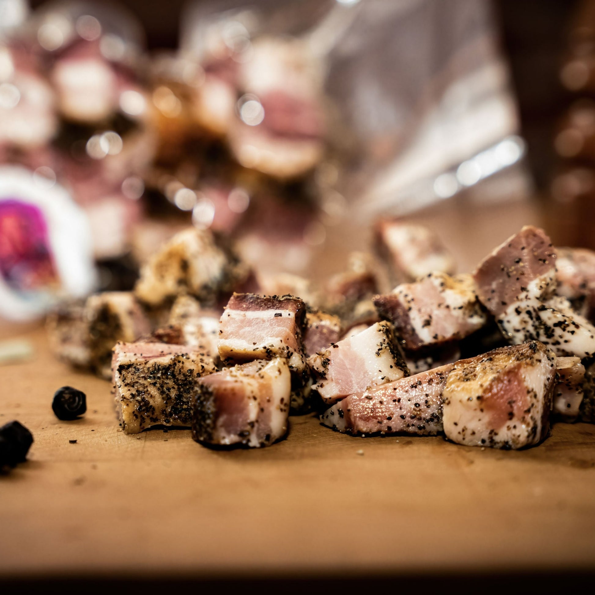 chopped bacon croutons lying on table